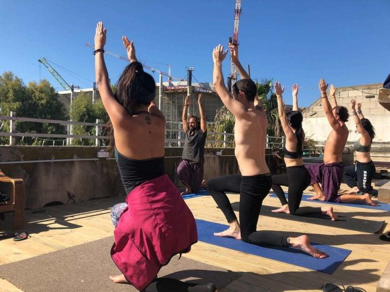 yoga lesson at overstay jaffa hostel